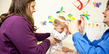 photo of mom with toddler at doctor's office